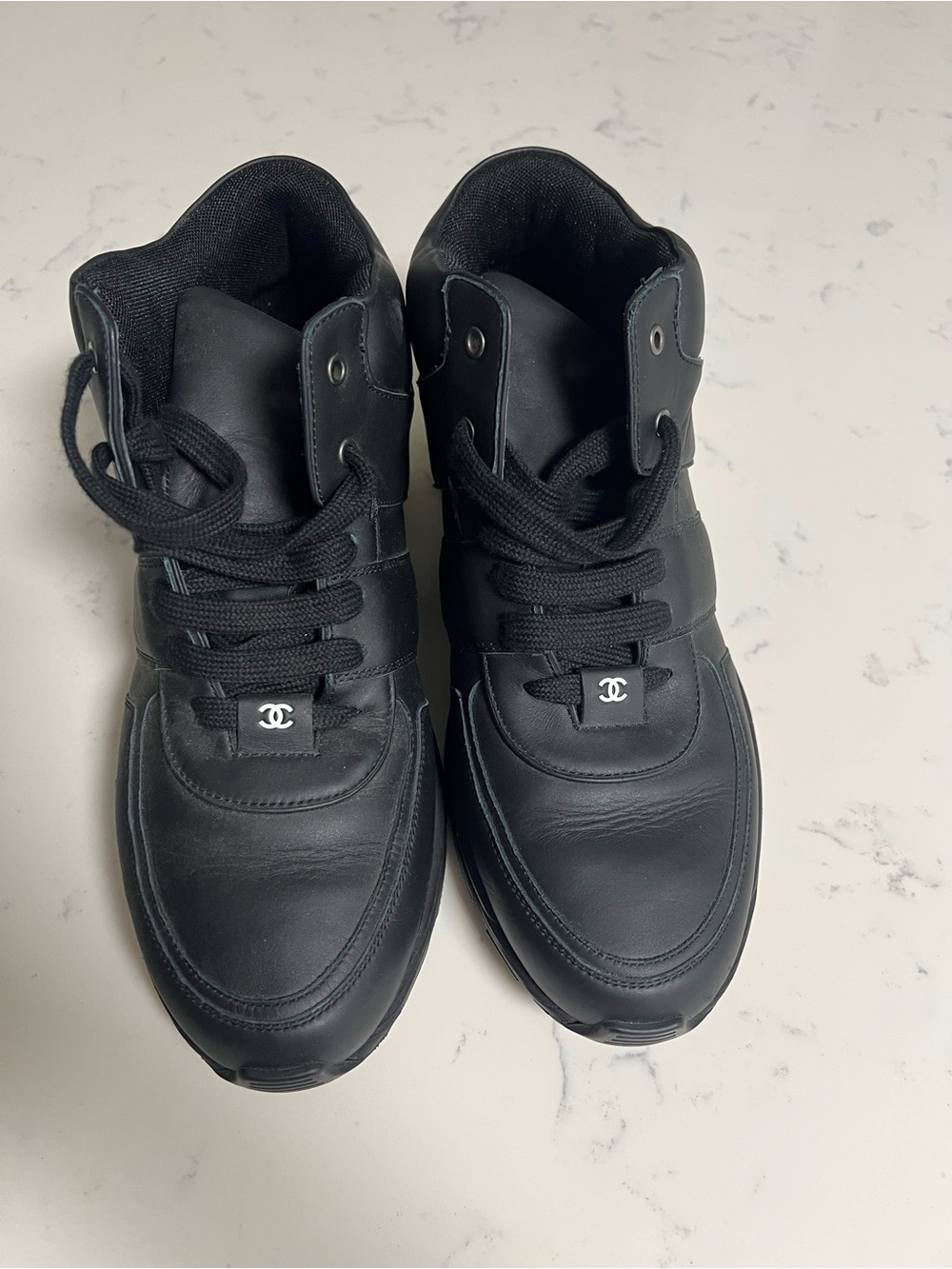 CHANEL Black Men's High-Top Leather Sneakers with Logo Tab